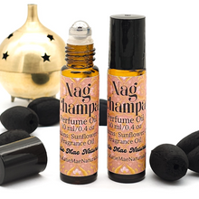 Load image into Gallery viewer, Phthalate Free nag champa fragrance oil roll on perfume in amber glass bottle