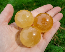 Load image into Gallery viewer, Honey Calcite Sphere