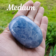 Load image into Gallery viewer, Blue calcite palm stone gemstone, ethically mined