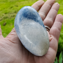 Load image into Gallery viewer, Blue calcite palm stone gemstone, ethically mined