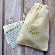 Load image into Gallery viewer, Capricorn candle and crystal set in a reusable cloth gift bag