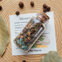 Load image into Gallery viewer, Small glass bottle of herbs for attracting money