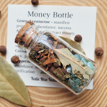 Load image into Gallery viewer, Small bottle of herbs for attracting money