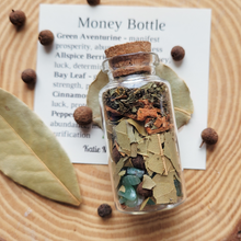 Load image into Gallery viewer, Money spell bottle of gemstones and herbs