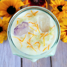 Load image into Gallery viewer, Butterfly Flower Soy Wax Candle in Recycled Glass Skull Jar - 15 oz
