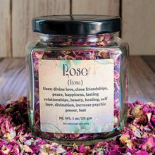 Load image into Gallery viewer, Dried rose petals in a square jar with a label against a wooden background
