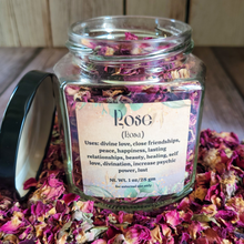 Load image into Gallery viewer, Dried rose petals in a square jar with a label against a wooden background