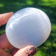 Load image into Gallery viewer, Selenite Palm Stone with Etched Lotus Flower