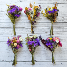 Load image into Gallery viewer, Six dried flower bouquets on a wooden surface
