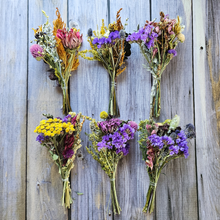 Load image into Gallery viewer, Bouquets of dried flowers arranged on a wooden surface
