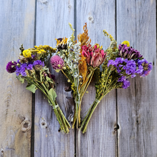 Load image into Gallery viewer, Three bouquets of dried flowers on a wooden surface
