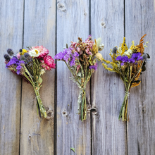 Load image into Gallery viewer, Three dried flower bouquets on a wooden surface
