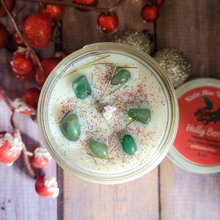 Load image into Gallery viewer, Hand poured soy wax candle with crystals for Yule
