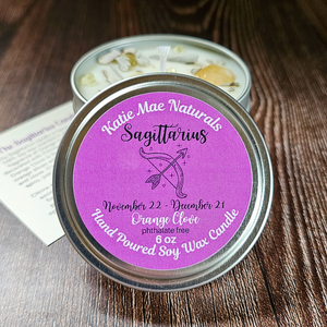 Sagittarius zodiac candle with gemstones