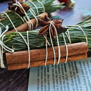 Small fresh evergreen bundle for Yule decor with cinnamon and star anise