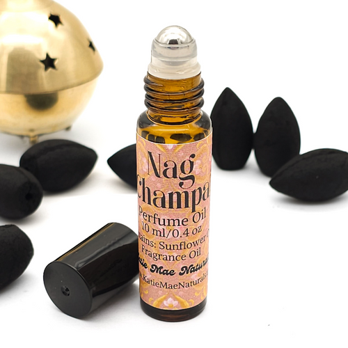 Phthalate Free nag champa fragrance oil roll on perfume in amber glass bottle 