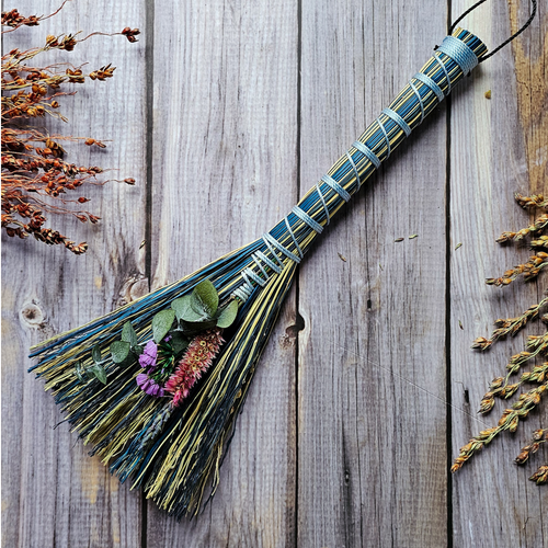 Mini altar broom adorned with dried flowers