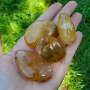 Golden healer quartz palm stones