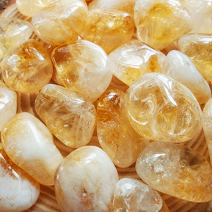 Tumbled citrine crystals, ethically mined