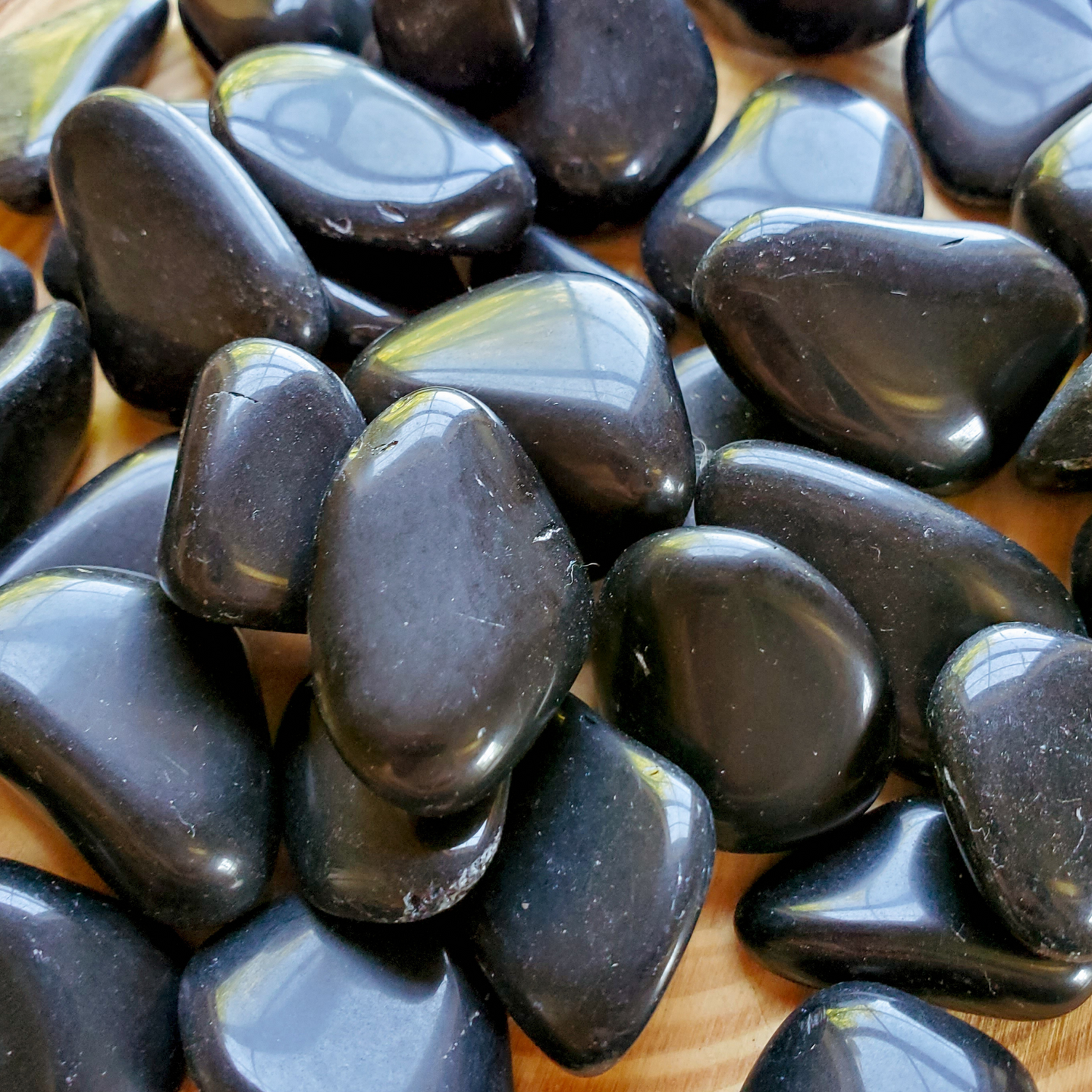 Tumbled obsidian gemstones