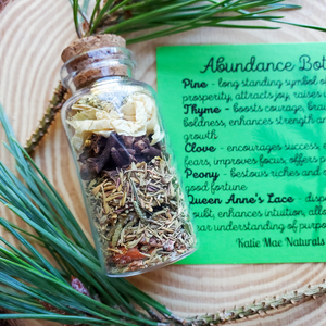 Abundance spell bottle of herbs for prosperity 