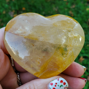 Carved golden healer quartz crystal heart