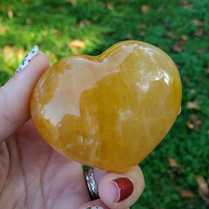 Carved golden healer quartz crystal heart