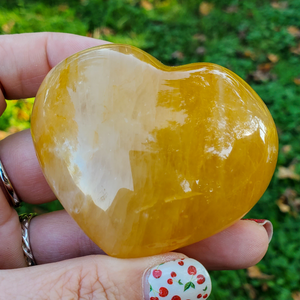 Carved golden healer quart crystal heart