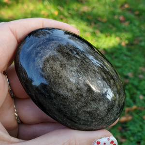 Silver obsidian palm stones