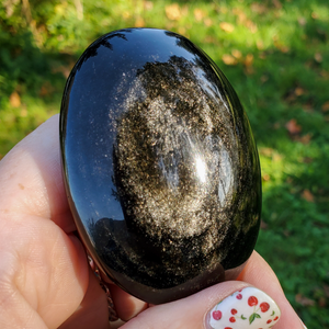 Silver sheen obsidian palm stone 