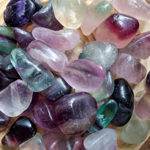 Tumbled rainbow fluorite stones