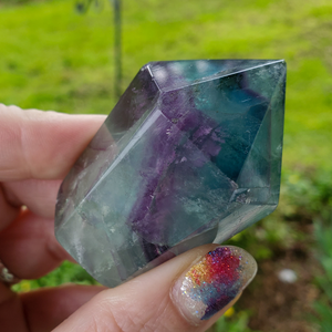 Rainbow fluorite crystal point