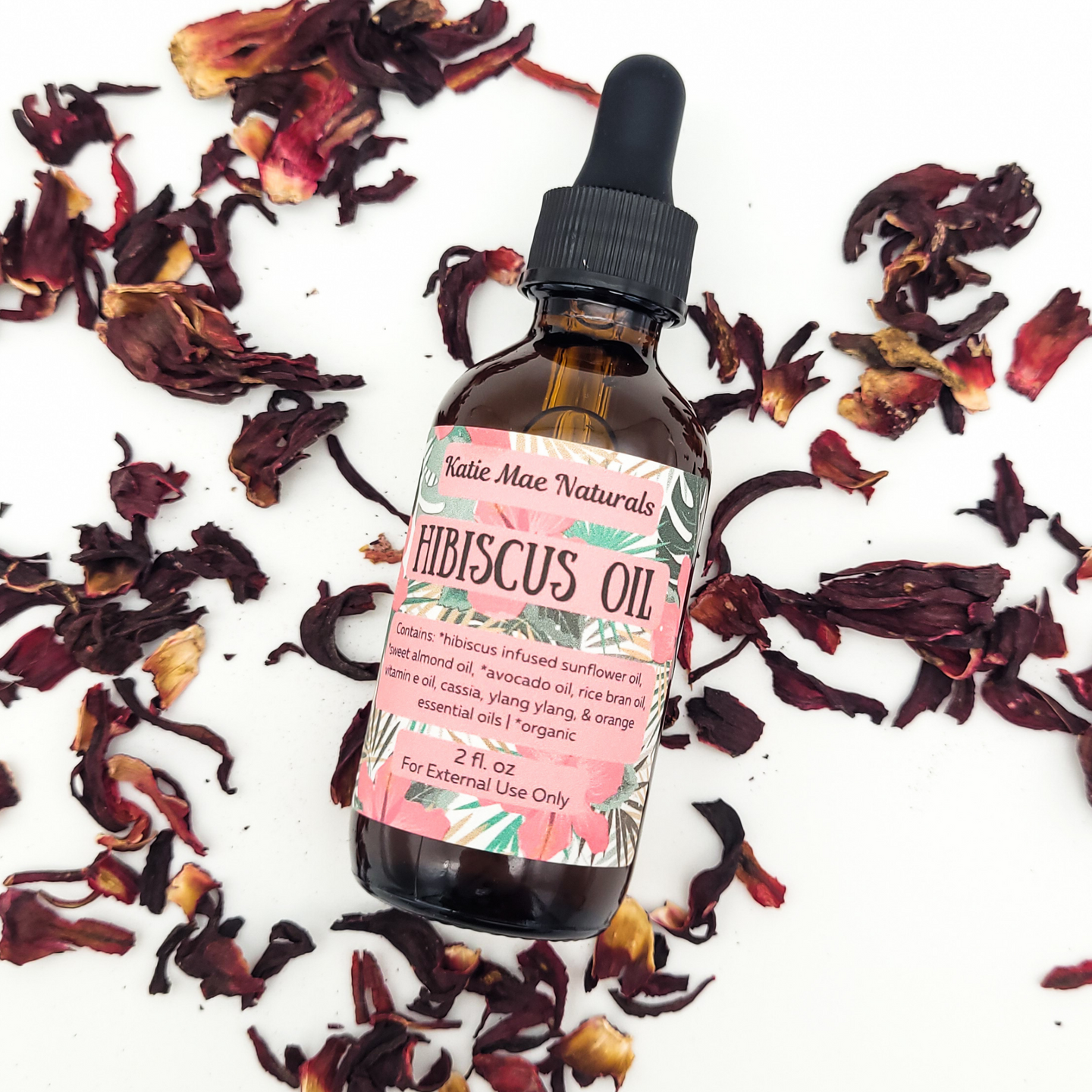 Herb infused hibiscus oil for divine feminine energy 