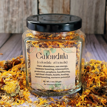 Load image into Gallery viewer, Apothecary jar of organic dried Calendula flowers 
