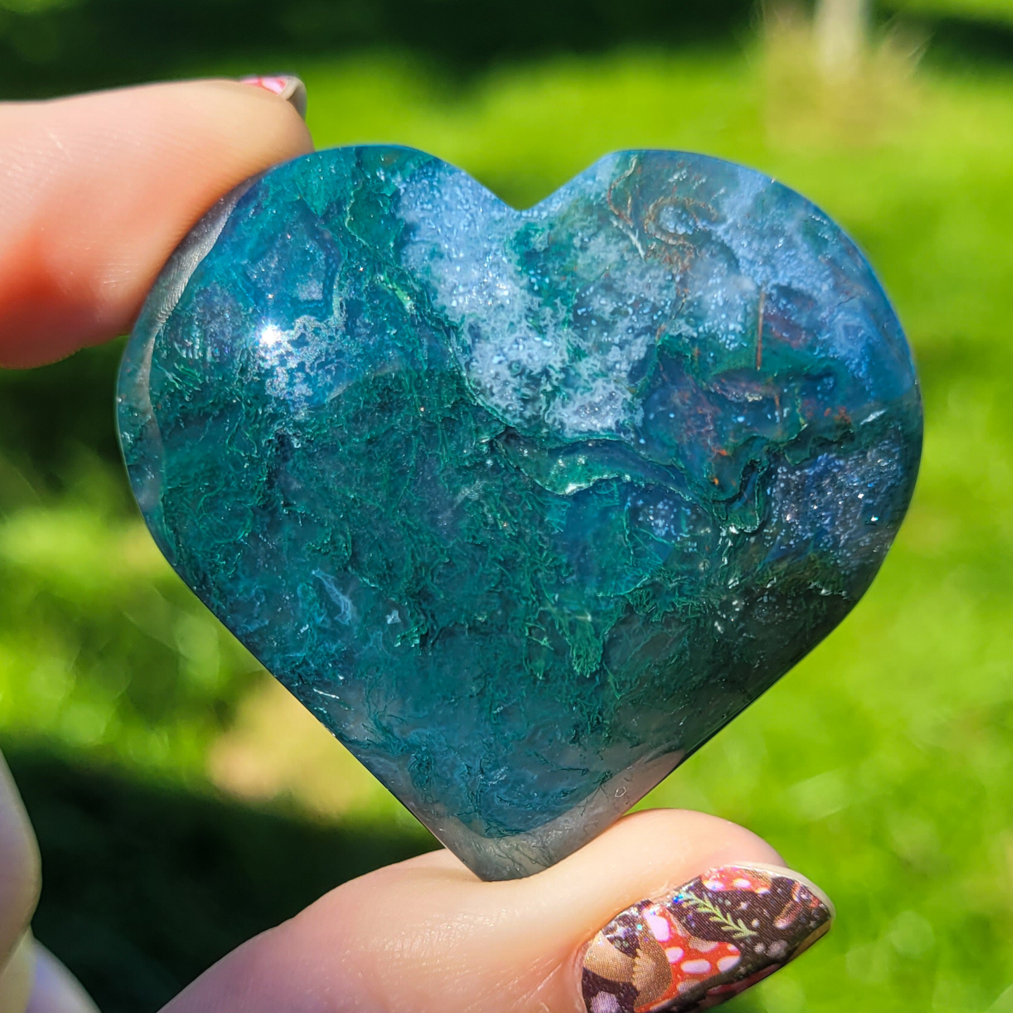 Moss agate heart carving