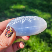 Load image into Gallery viewer, Selenite Palm Stone with Etched Lotus Flower
