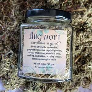 Apothecary jar of organic dried mugwort 
