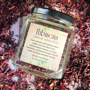 Apothecary jar of dried organic hibiscus flowers