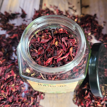 Load image into Gallery viewer, Apothecary jar of organic dried Hibiscus flowers 
