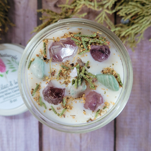 Load image into Gallery viewer, Hand poured soy wax candle with crystals for Ostara 
